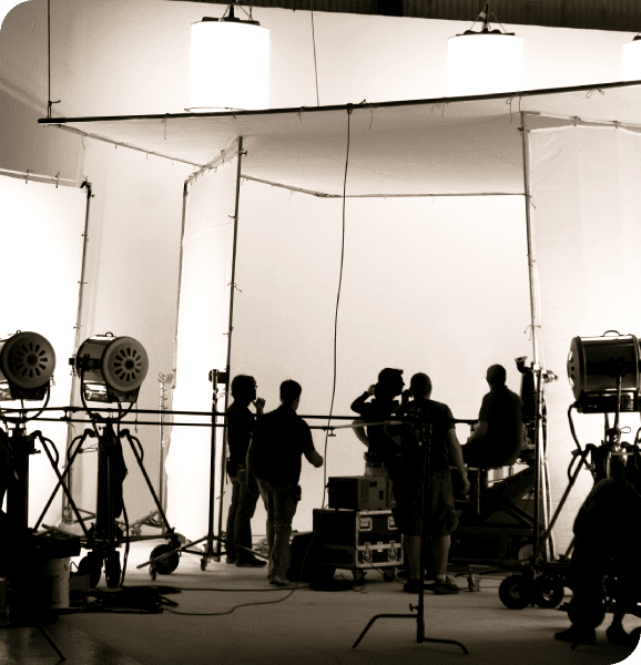 Film crew working on a studio set.